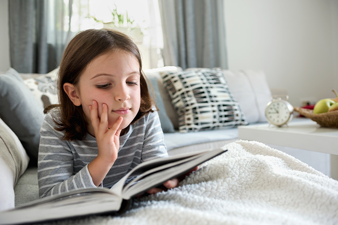 Child reading a book