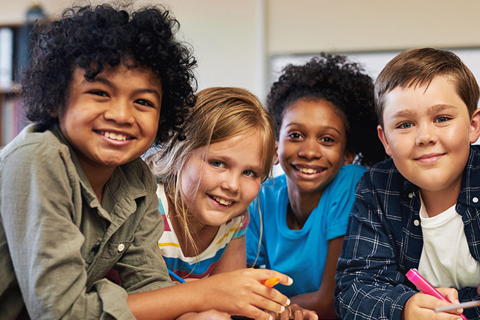 Group of kids smiling together